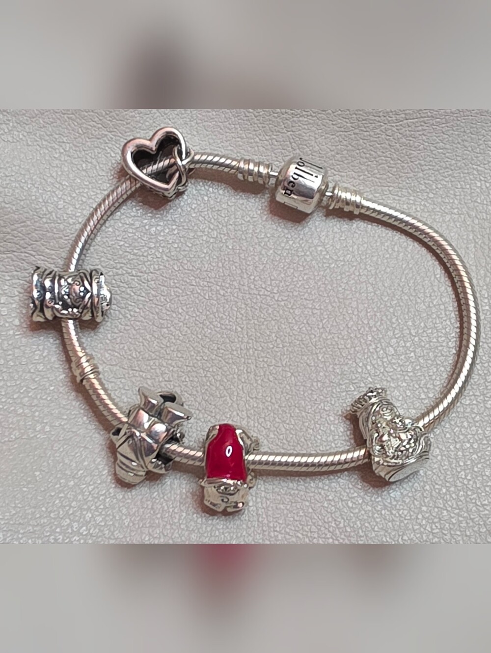 925 STERLING SILVER CHARM BRACELET ALL CHARMS MARKED 925 AND SO IS THE BRACELET